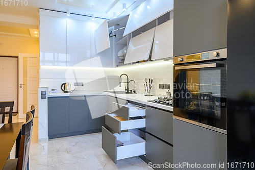 Image of Luxury white and dark grey modern kitchen interior