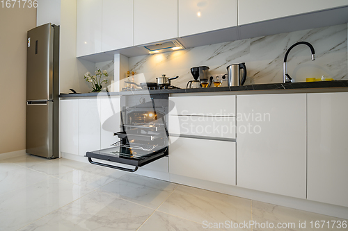 Image of White kitchen in classic style, front view