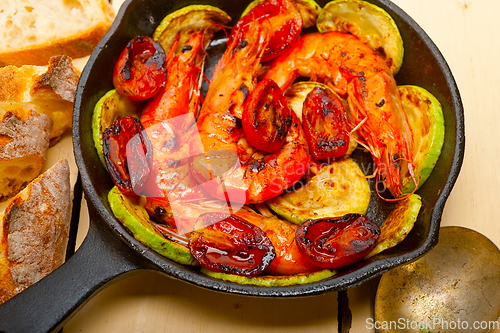 Image of roasted shrimps with zucchini and tomatoes