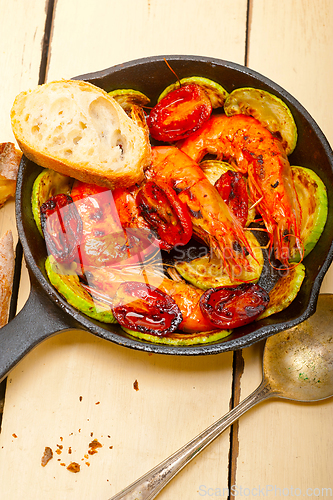 Image of roasted shrimps with zucchini and tomatoes