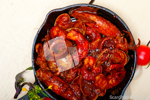 Image of fresh seafoos stew on an iron skillet