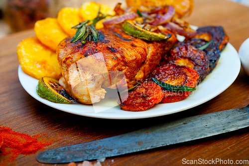 Image of roasted grilled BBQ chicken breast with herbs and spices