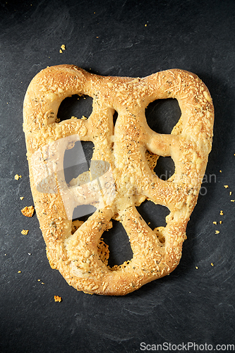 Image of close up of cheese bread on kitchen table