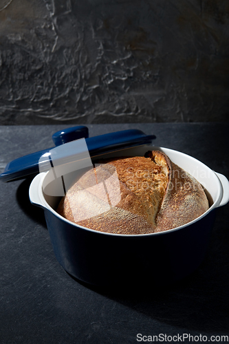 Image of homemade craft bread in ceramic baking dish