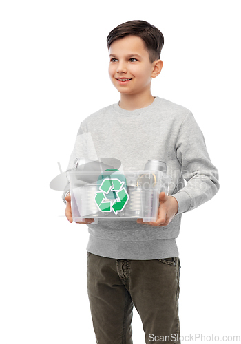 Image of smiling boy sorting metallic waste