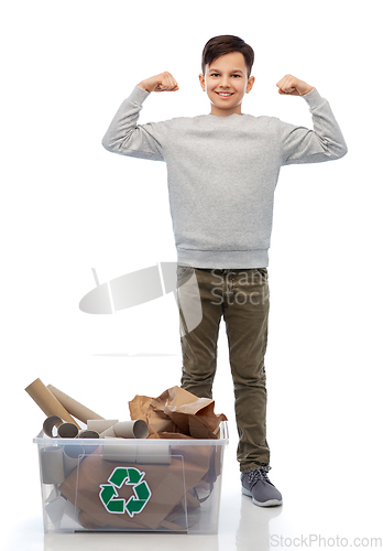 Image of smiling boy sorting paper waste