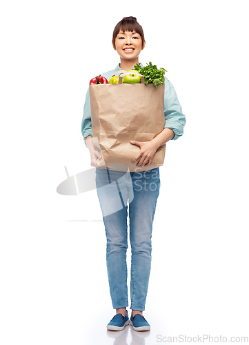 Image of happy smiling asian woman with food in paper bag