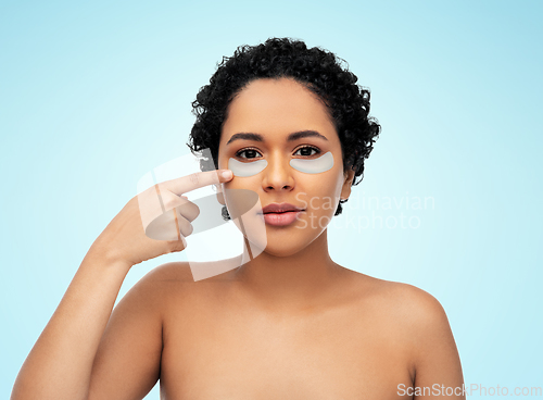 Image of african american woman with hydrogel eye patches