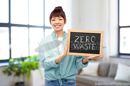 Image of asian woman holds chalkboard with zero waste words