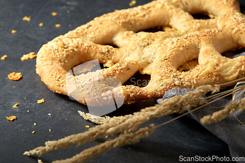 Image of close up of cheese bread on kitchen table