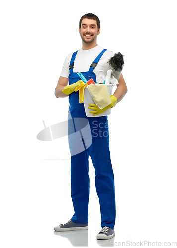 Image of male cleaner in overall with cleaning supplies