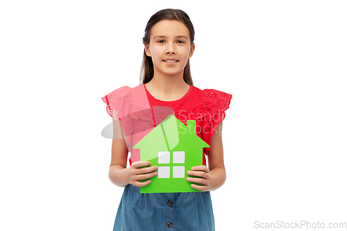 Image of smiling little girl holding green house icon