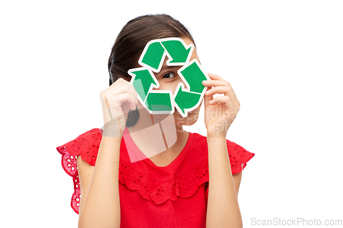 Image of smiling girl holding green recycling sign