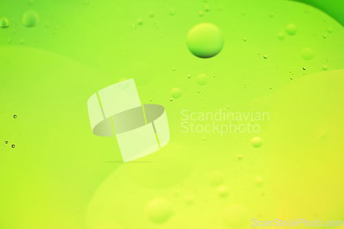 Image of Green and yellow abstract background picture made with oil, water and soap