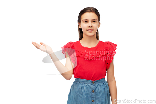 Image of happy smiling girl holding something on her hand