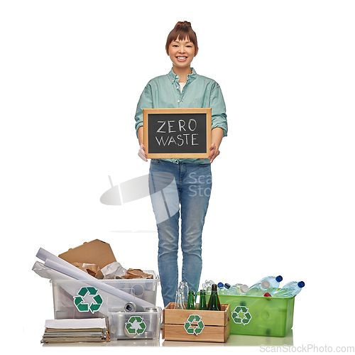 Image of asian woman with zero waste words on chalkboard