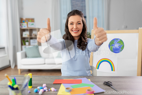 Image of teacher having online class of arts and crafts