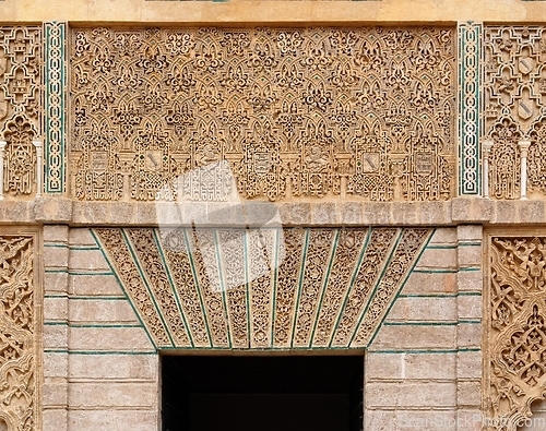 Image of Carved relief above the door in the Royal Alcazar palace in Seville, Spain