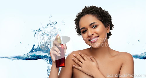 Image of young african american woman with unscreen oil