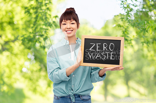 Image of asian woman holds chalkboard with zero waste words