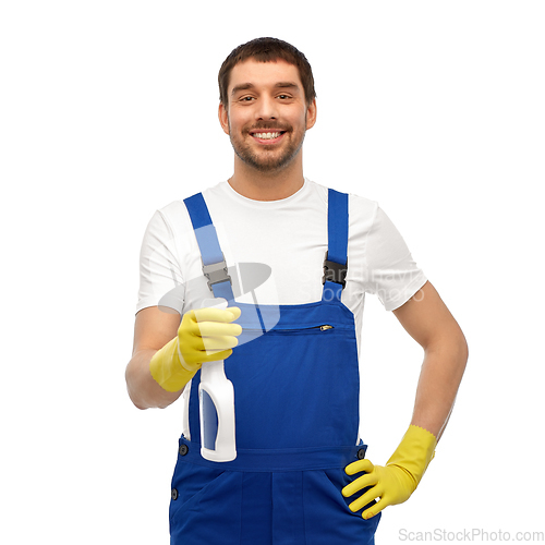 Image of male cleaner cleaning with detergent