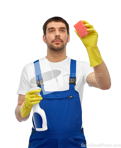 Image of male cleaner cleaning with sponge and detergent