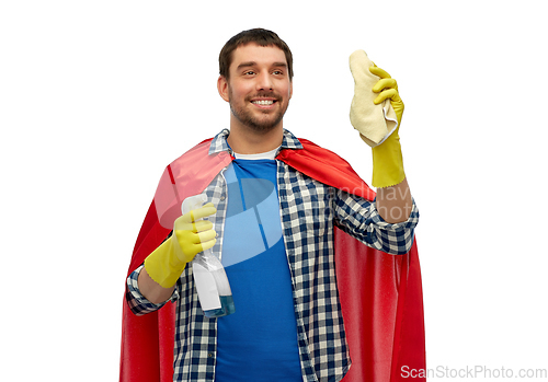 Image of smiling man in superhero cape with rag and cleaner