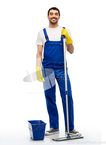 Image of male cleaner cleaning floor with mop and bucket