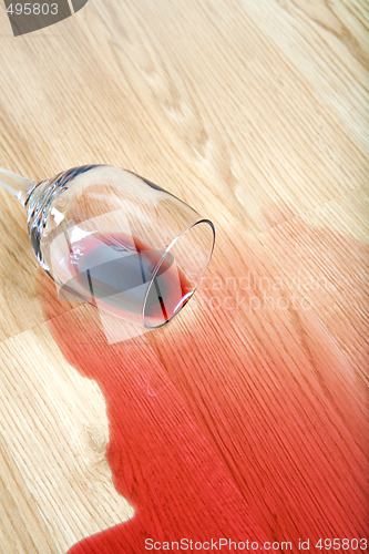 Image of wine spilled on floor