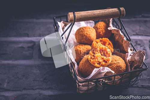 Image of Homemade Arancini -  deep fried rice balls stuffed with Mozzarella cheese