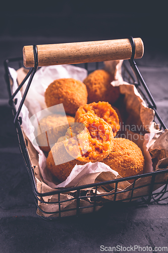 Image of Homemade Arancini -  deep fried rice balls stuffed with Mozzarella cheese