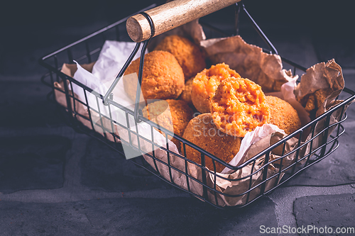 Image of Homemade Arancini -  deep fried rice balls stuffed with Mozzarella cheese