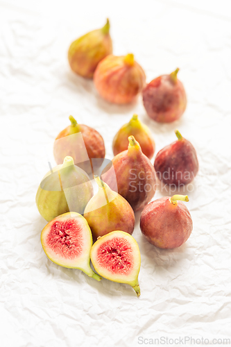 Image of Tasty organic figs on white background