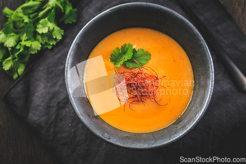 Image of Roasted pumpkin and carrot soup with  red lentils, ginger and chili