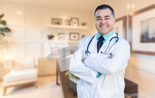 Image of Handsome Hispanic Doctor or Nurse Standing in His Office