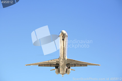 Image of airplane against clear blue sky