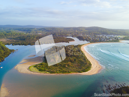 Image of Tomago river snakes around and meets the sea