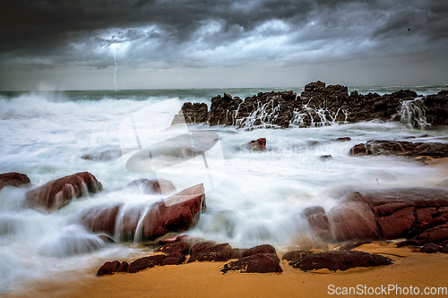 Image of Storm over beach and turbulent waves