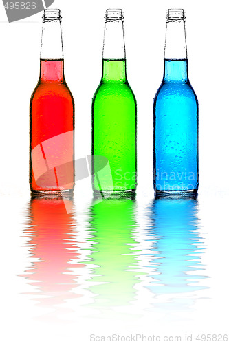 Image of bottles red green and blue with reflection isolated