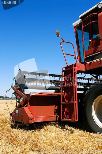 Image of combine on field