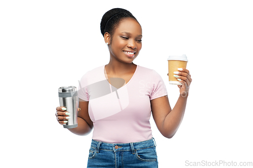 Image of woman with coffee cup and tumbler for hot drinks