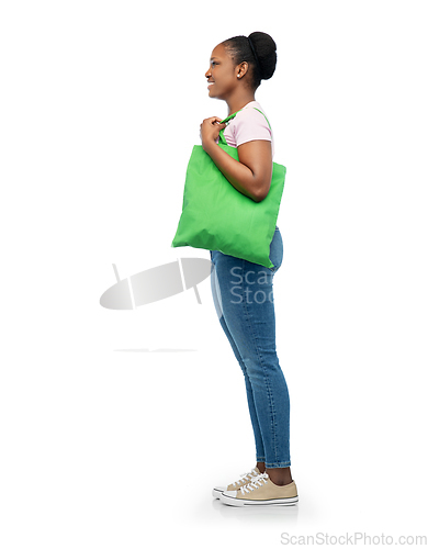 Image of woman with reusable canvas bag for food shopping