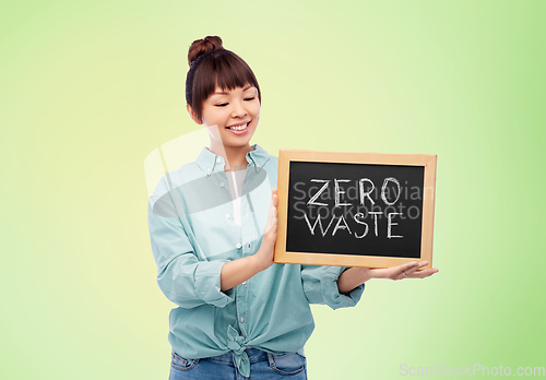 Image of asian woman holds chalkboard with zero waste words