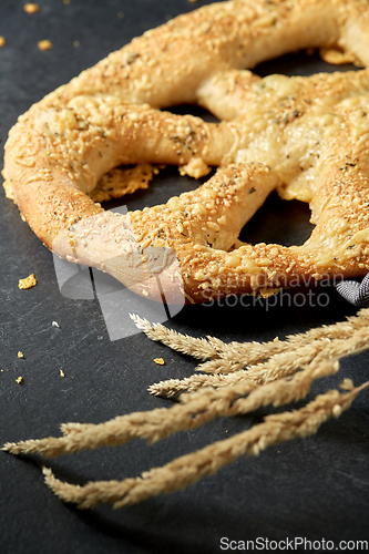 Image of close up of cheese bread on kitchen table