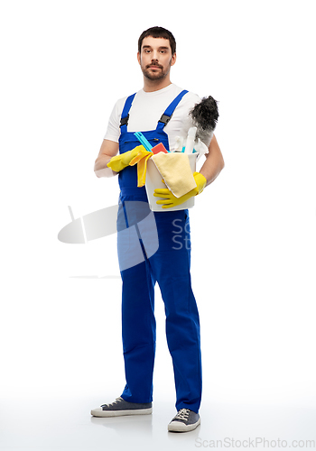 Image of male cleaner in overal with cleaning supplies