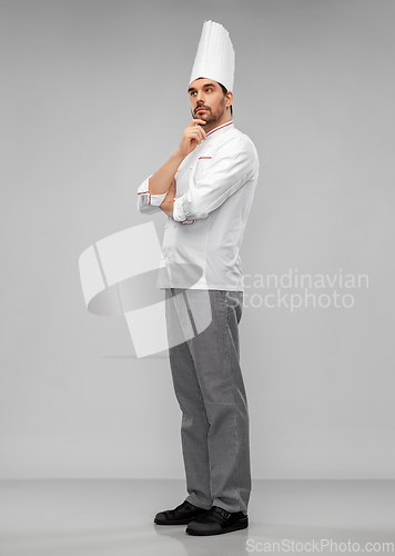 Image of thinking male chef in toque