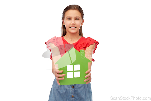 Image of smiling little girl holding green house icon