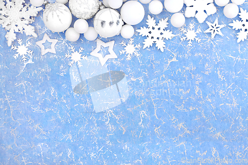 Image of Fantasy Christmas Blue Background with Snowflakes and Baubles