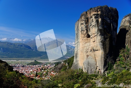 Image of City of Kalabaka under the picturesque Meteora rock formations in Greece