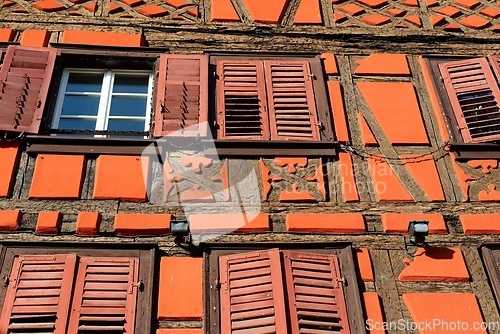 Image of Facade of fachwerkhaus, or timber framing, in Riquewihr village, Alsace, France